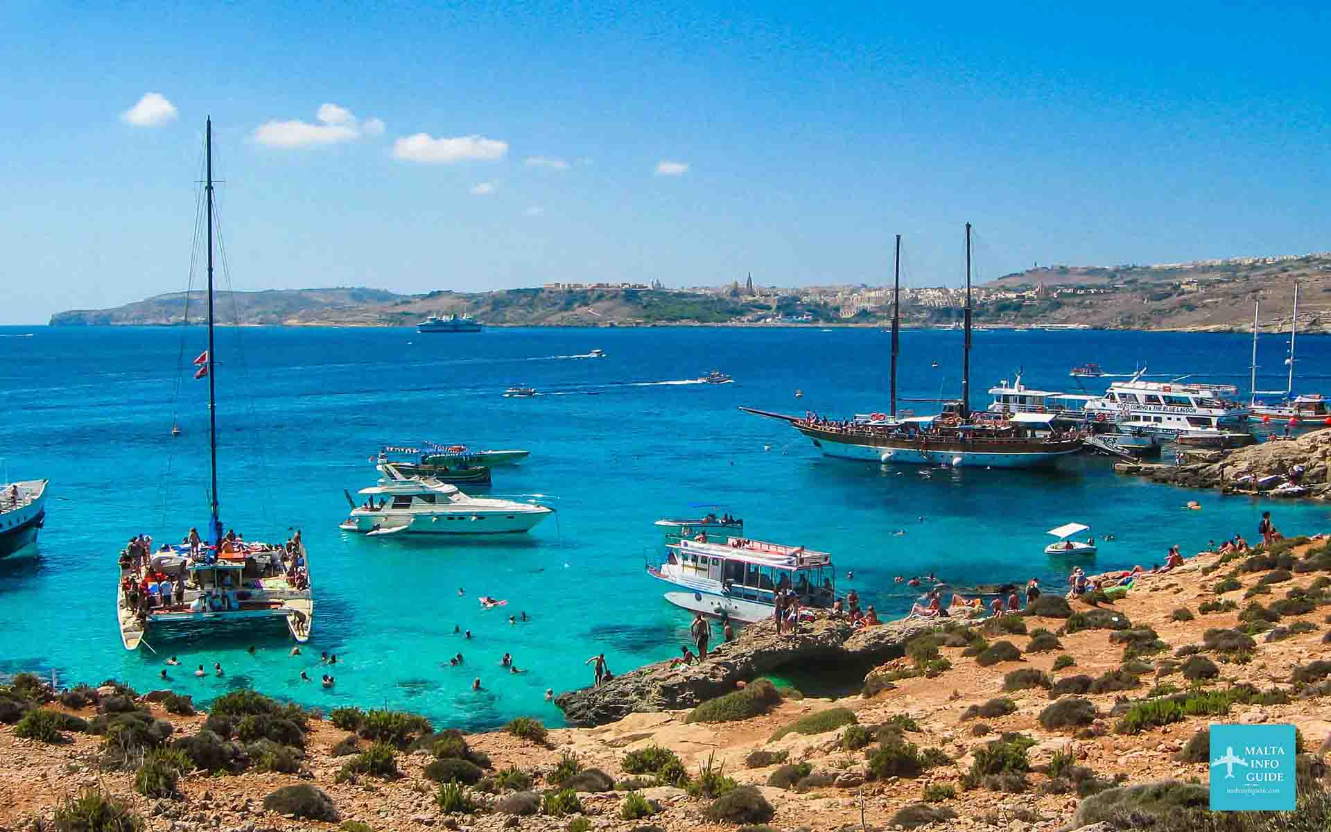 A number of boats moored at Comino island.